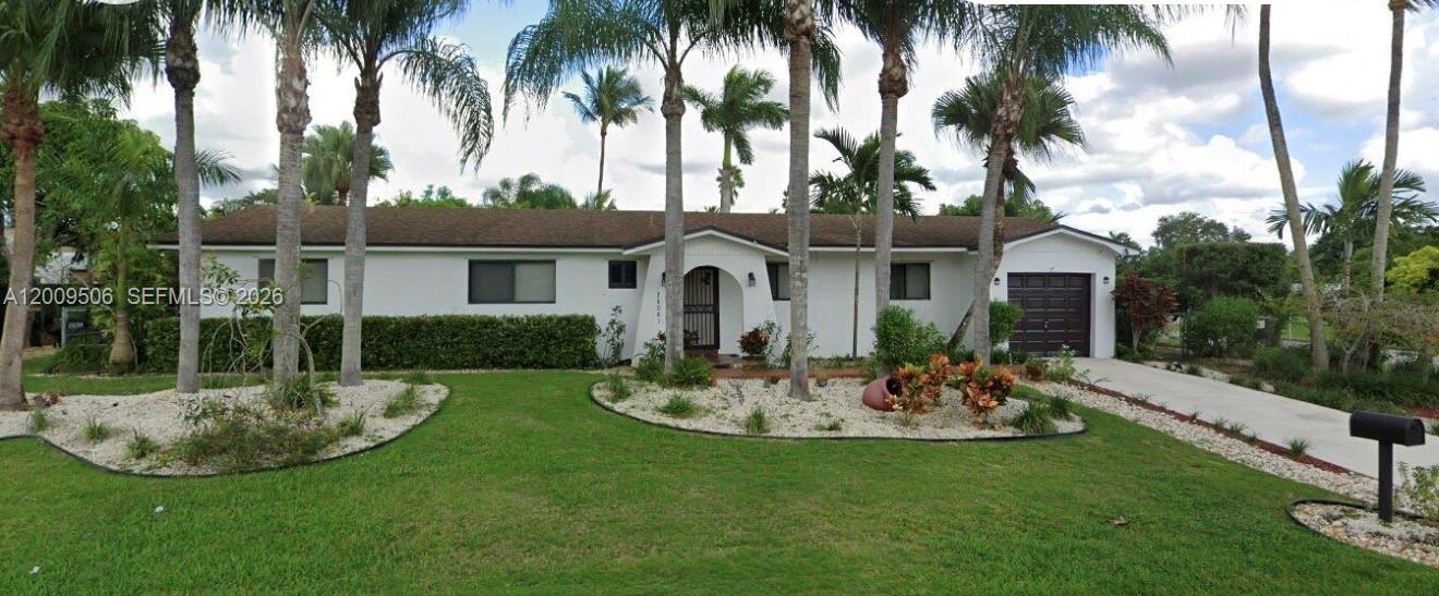 4 bedroom with two baths on full 1/2 acre home with plenty of landscape and block storage/work shed. Wood lament floors thru out and tile in kitchen and Florida room. Updated kitchen and bathrooms.  Come make this home your own.  New impact windows and doors.  AC 2018 with 10 year warranty.  Seller will contribute to closing costs. Please make appointment as home is occupied. Please text agent.