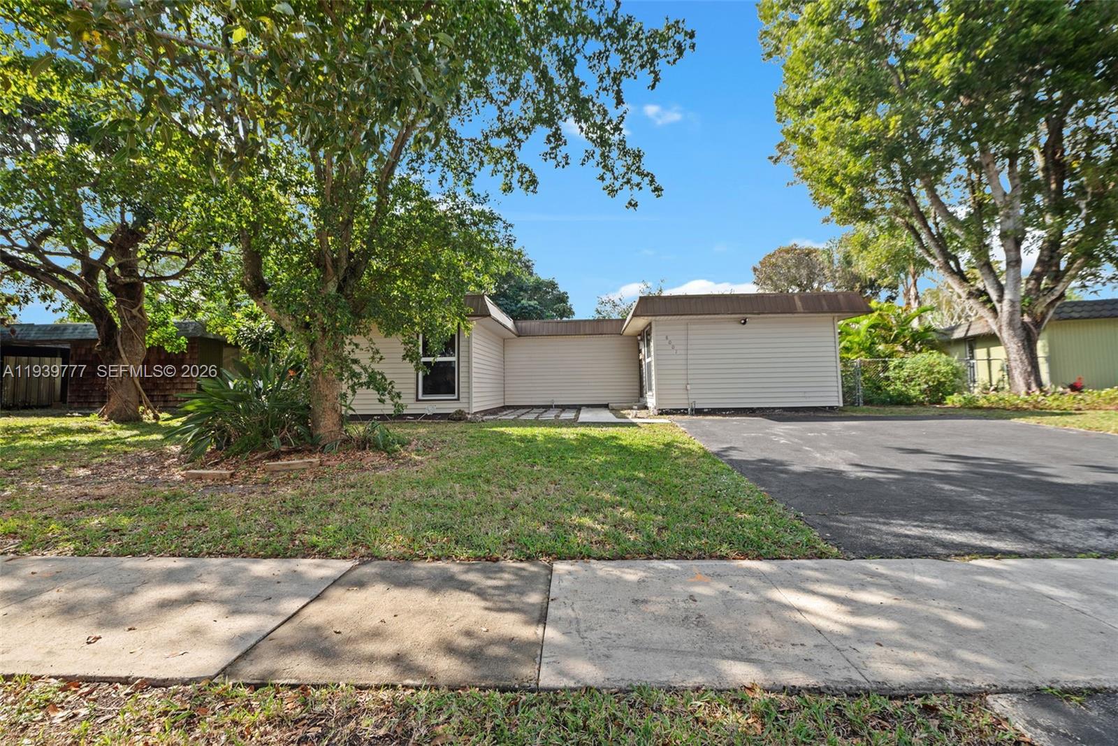 Welcome to this charming one-story home located in the desirable Heathgate subdivision, known for its quiet, tree-lined streets and established neighborhood feel. This 2-bedroom, 1-bath residence offers comfort, convenience, and true ownership freedom with 1 low yearly HOA fee. Key features include a newer roof and impact windows throughout, providing peace of mind, security, and energy efficiency.The interior offers a functional layout filled with natural light, along with a washer and dryer conveniently located inside the home. Step outside to a large, fully fenced yard with endless potential—perfect for entertaining, pets, gardening, or future expansion, with plenty of room to add a pool. The property also features a screened-in rear patio, ideal for relaxing year-round, and a storage shed for added utility.Ideally situated close to main roads, shopping, dining, and everyday conveniences, this home combines a peaceful residential setting with easy access to everything you need. A great opportunity for first-time buyers, downsizers, or investors seeking a well-located property with upgrades and outdoor space.