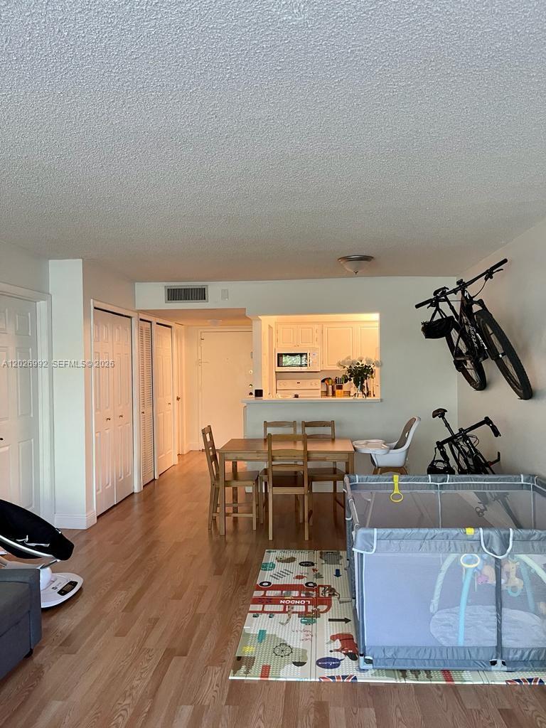 BUILDING FOUR OF RACQUET - Residential Lease