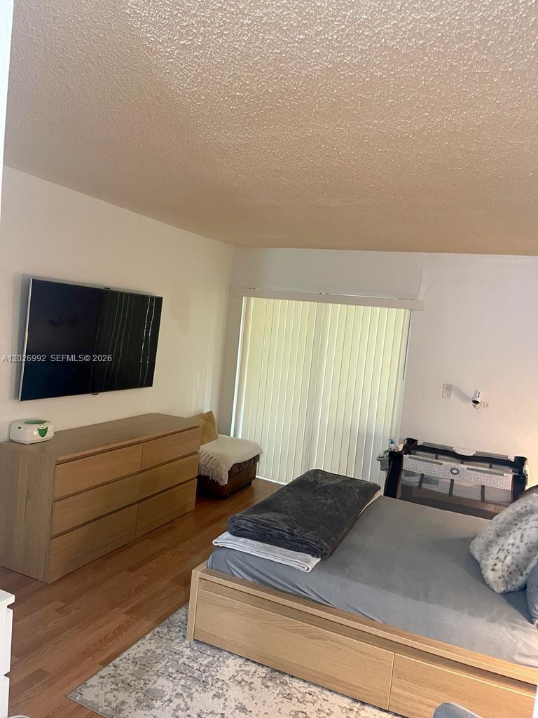 BUILDING FOUR OF RACQUET - Residential Lease