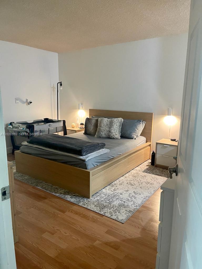 BUILDING FOUR OF RACQUET - Residential Lease