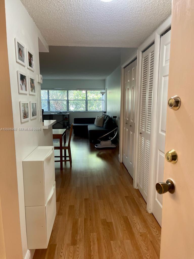 BUILDING FOUR OF RACQUET - Residential Lease