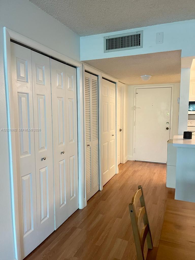 BUILDING FOUR OF RACQUET - Residential Lease