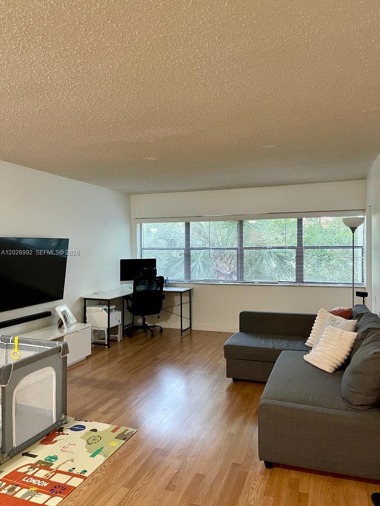BUILDING FOUR OF RACQUET - Residential Lease