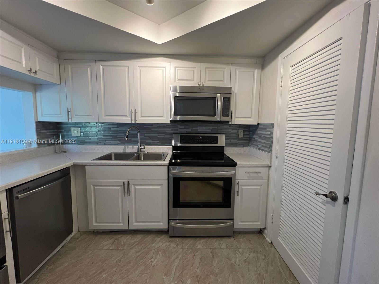 Beautiful townhouse for sale in a prime Deerfield Beach location—just minutes from Boca Raton, Pompano Beach, and only 10 minutes from Hillsboro Beach. Nestled in a quiet, well-maintained community, this home features 2 bedrooms (each with its own private balcony), 1 full bathroom, 1 half bathroom, a screened-in patio, a separate dining room, tile flooring throughout, and an in-unit washer and dryer. Investor alert: Rentals are allowed immediately and the community has no age restrictions, making this an excellent option for both personal use and a high-demand investment property. The community is all ages, pet-friendly, and offers two assigned parking spaces, making this a fantastic buying opportunity in a highly convenient and desirable area.
