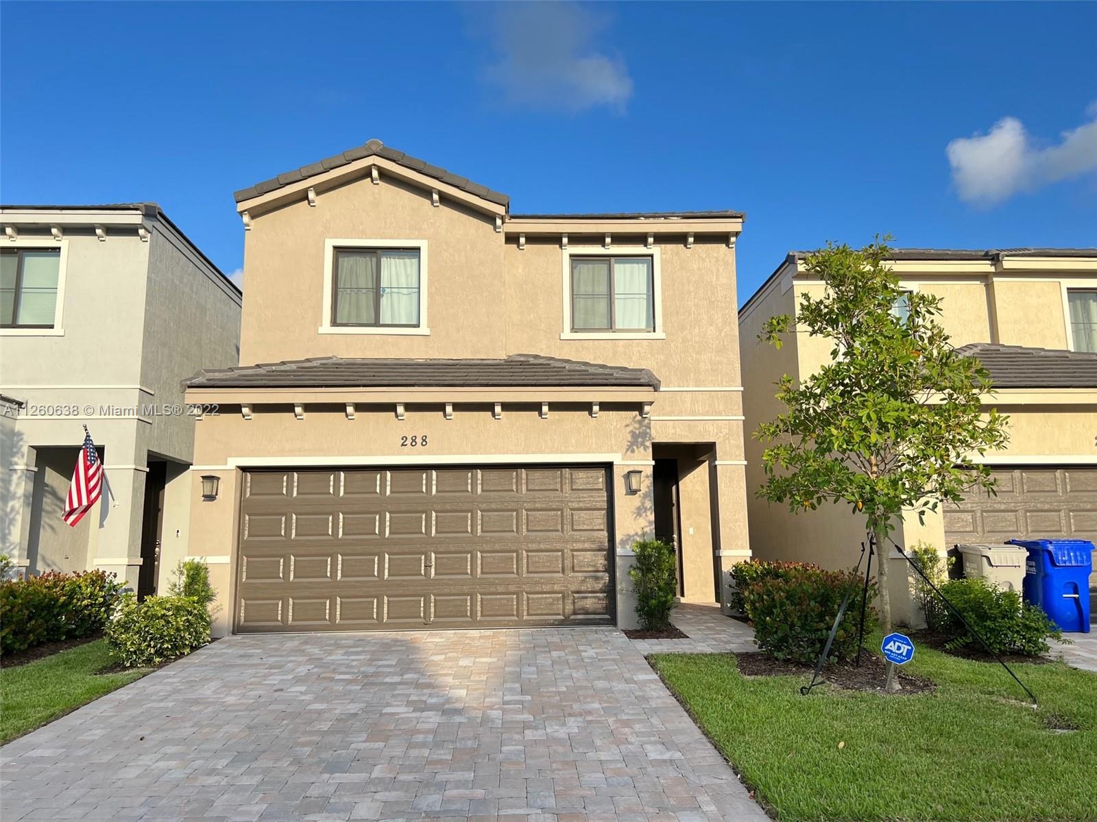 Enjoy this new house built in 2021. This gorgeous 3 bed (+ bonus loft/office), 2.5 bath, 2 car garage home features an open concept layout with tile flooring downstairs main living area, carpet upstairs. Offering outdoor living with an extended balcony. Washer & Dryer upstairs for convenience. Enjoy this beautiful light & bright home in the gated community of Vantage in the heart of Pompano Beach! Association provides water/sewer, cable, internet & yard maintenance! This house is super spacious, come and see all the great benefits this home has to offer. Impact windows and doors throughout, great for your family safety and insurance savings of up to 30%