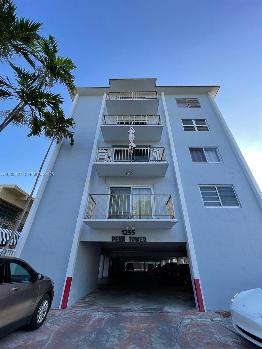 Super find in the heart of south beach. Quiet street only 5 blocks from the beach. This apartment is completely redone, in move-in condition. Only lightly used as a vacation home. Extra details include washer, dryer, ceiling and lighting fixtures, dimmers, new cabinets and appliances, new flooring, completely new bath with tub, new central air with electric thermostat, new interior doors, even the electric panel was replaced. The building is gated, the unit is at the end of the catwalk on the rear corner so it is quiet and private. The view is very nice. It is airy overlooking a low rise home with east exposure and a perfect sized balcony for a couple pieces of furniture. There are windows in every room. The rooms are very spacious with a walk in closet in the principal bedroom. The building has a new roof. Reserves are part of the maintenance fee. No pending assessments and all building inspections are up to date. Building was painted 2 years ago. One gated parking space is included.