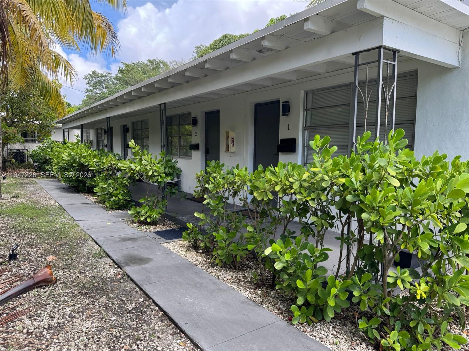 Multifamily with 5 studio units, fully permitted, all units rented, generating immediate cash flow. Prime location on vibrant 2nd Ave in Buena Vista, just 0.7 mi from Miami Design District and near Wynwood, ensuring strong tenant demand. Studios feature separate FPL meters and CBS construction. 6,099 sq ft lot with T4-O zoning (residential, commercial, entertainment) plus adjacent vacant parcels offer huge development upside. Perfect for short-term rentals (Airbnb/VRBO) with potential to dramatically boost income and ROI. Don’t miss this rare opportunity—schedule your showing today!