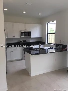 COCO PALM VILLAS - Residential Lease