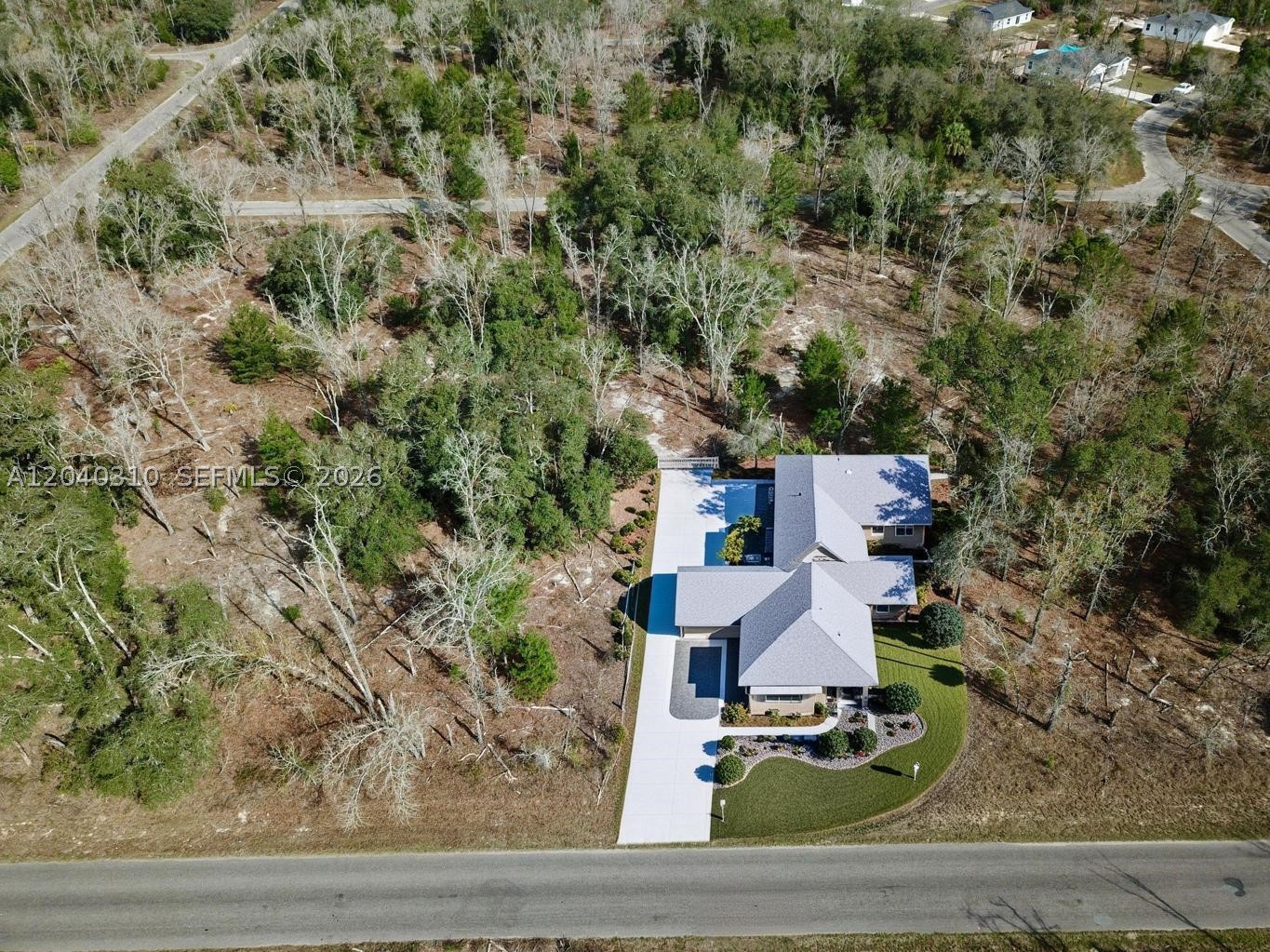 This 0.28-acre lot in Marion County, FL is a fantastic opportunity to build your dream home or invest in land. With R-1 zoning, this property is designated for single-family residential use, making it ideal for those looking to build a permanent home or a quiet retreat. The location is unbeatable, Lake Weir is just a short drive away, perfect for boating, fishing, and enjoying the water. You’re also close to Ocala, where you’ll find shopping, dining, and essential services. nature lovers will appreciate the proximity to the Ocala National Forest, offering hiking, camping, and outdoor adventures. With no HOA, you have the freedom to develop the property on your terms. Land in this area is in high demand, making this a great buy whether you're ready to build now or hold as an investment.