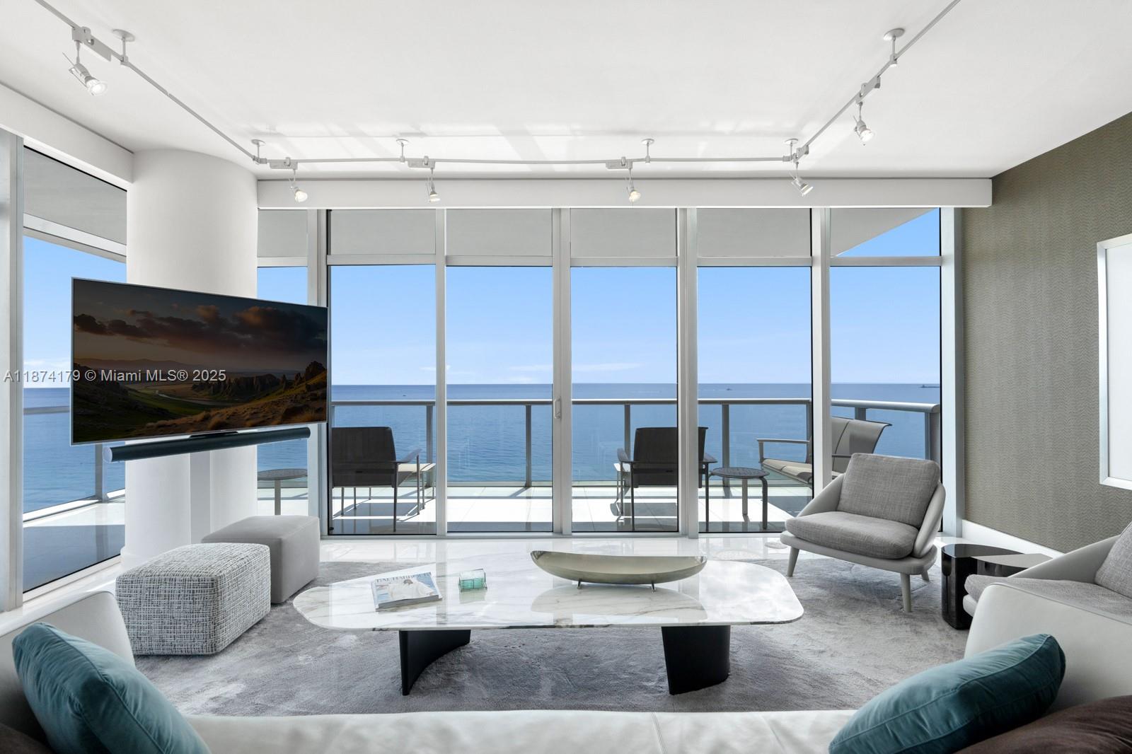 Rarely Available "01" Line with Direct Ocean Views at The Caribbean. Experience unparalleled beachfront living in this Corner Turnkey 3-bedroom, 2.5-bath residence on the 15th floor.  Floor-to-ceiling glass throughout offers dramatic unobstructed ocean views. Step outside onto your 800 sq. ft. wraparound balcony, where seamless indoor/outdoor living awaits—ideal for entertaining, relaxing, or simply soaking in breathtaking sunrises and ocean breezes. Inside, you’ll find a spacious layout with high-end finishes and beautiful design details. Enjoy a luxurious lifestyle with beach and pool service, wine and cigar storage, spa, gym, business center, 24-hour staff, and valet. Stroll the Boardwalk to Faena, Soho Beach House, The Edition, The Fontainebleau, and the upcoming Aman Miami Beach.