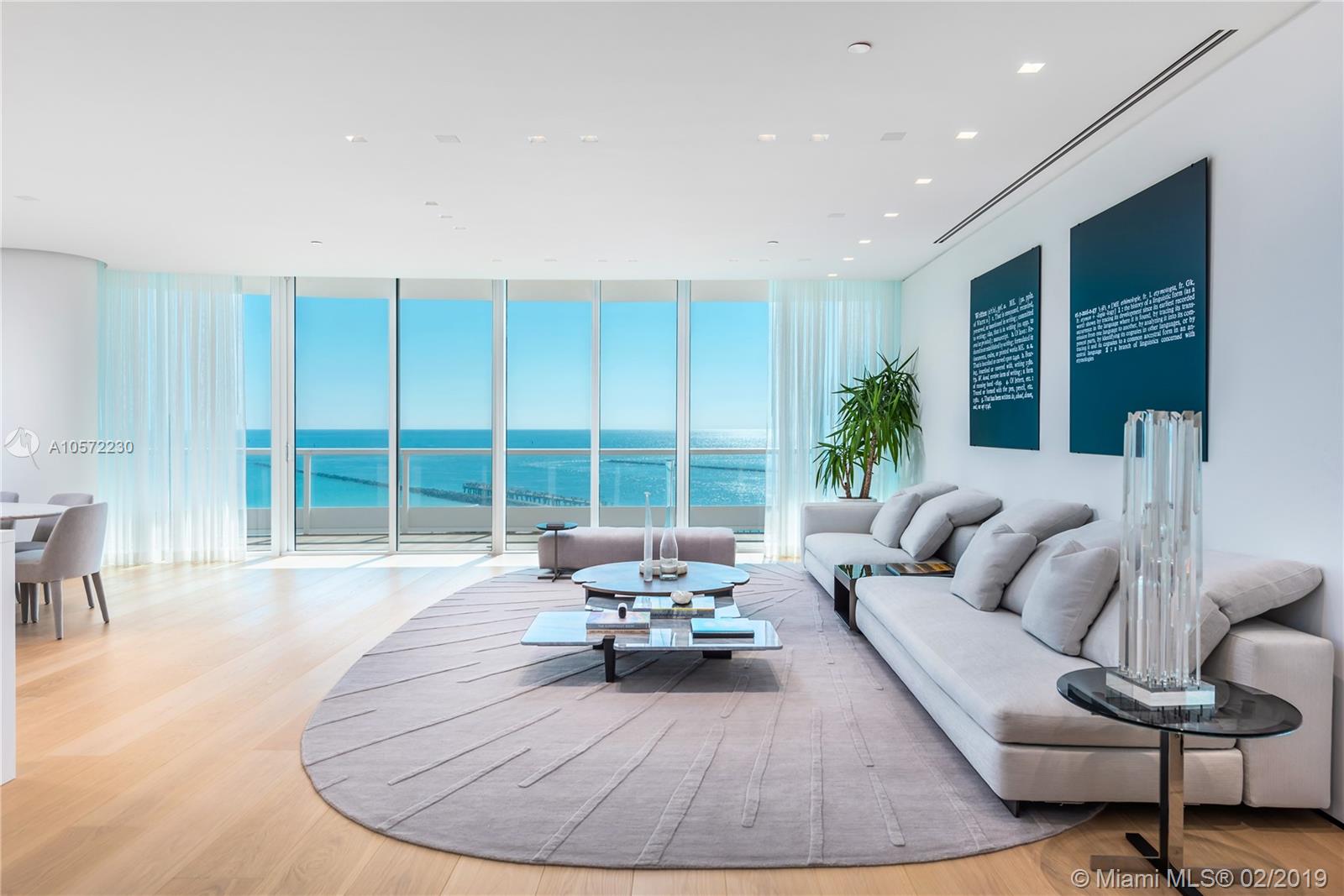 A modern oceanfront paradise in the heart of the city, this residence was completely renovated with no expense spared. Inspired by the surrounding sand and ocean, designed Deborah Wecselman with 1 FT x 10 FT Natural Oak flooring, Walnut laser cut book-matched panels upon entry, floating base boards & ceilings, a seamlessly integrated Boffi kitchen,  Thassos marble master bathroom and Carerra Marble Guest Baths. Take in the breathtaking sunrise and sunset through floor to ceiling glass windows that allow for uninterrupted views of the Atlantic Ocean, South Pointe Park and Biscayne Bay.
