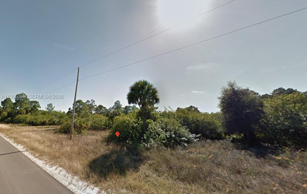 Very nice homesite in a growing area of Lehigh Acres! Canal view, near shopping, medical, airport! Excellent location for your new home, or for a spec house! NOT IN A FLOOD ZONE!