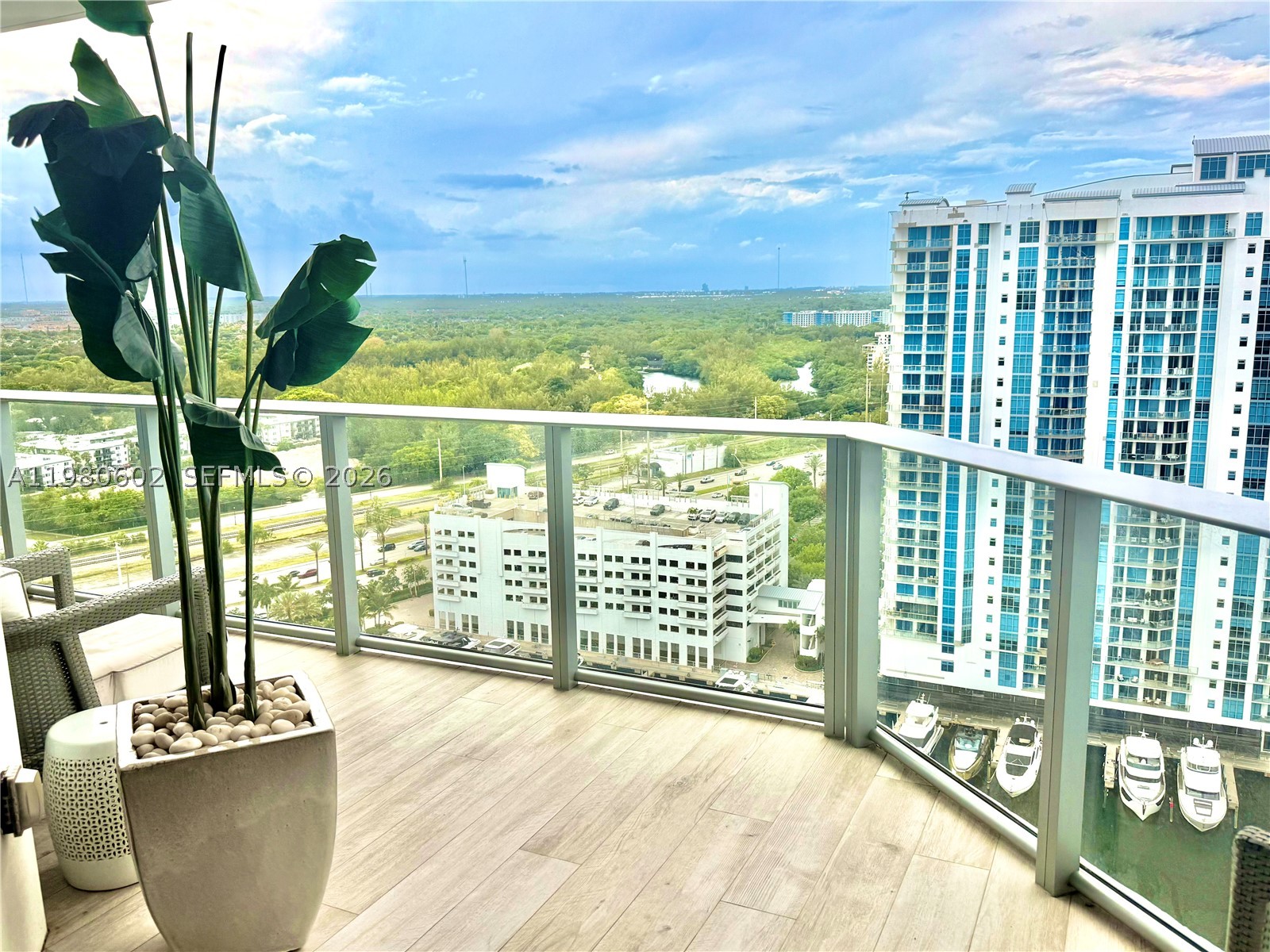Luxurious turnkey high-floor residence on the 23rd floor at The Reserve at Marina Palms with stunning unobstructed water and city views. Spacious layout offering two master suites. Two parking spaces included. One assigned covered parking space plus complimentary valet parking for a second vehicle.  including private storage. Full-service luxury building with 24-hour concierge, gated security, spa with sauna and steam room, state-of-the-art fitness center, yoga/Pilates studio, business lounge, infinity pool with summer kitchen, kids’ pool, play area, dog trail, and elegant lobby, Private marina, full service, up to 100' boat slips. Private boat club for residents! The best location! Move-in ready.