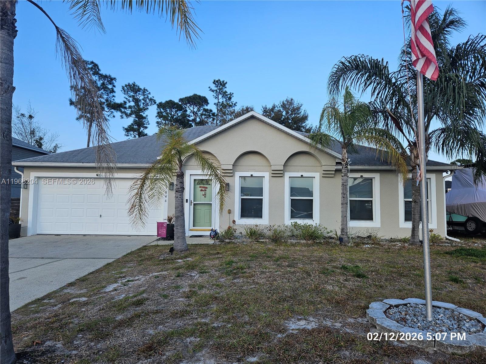 Remodeled to perfection, this beautiful 4-bedroom, 2-bathroom single-family home is located in Deltona FL and is ready to be your dream home. Interior features include a spacious living room, dining room, amazing kitchen with stainless steel appliances, cooking island, wall microwave and oven, oversized master bedroom with 2 walk-in closets, an attached 2-car garage and much more.  The 10,000 square foot lot, large backyard and screened patio with ceiling fans offers plenty of space for playing in the yard and hosting social gatherings. This property won't be on the market for long, so make your appointment today