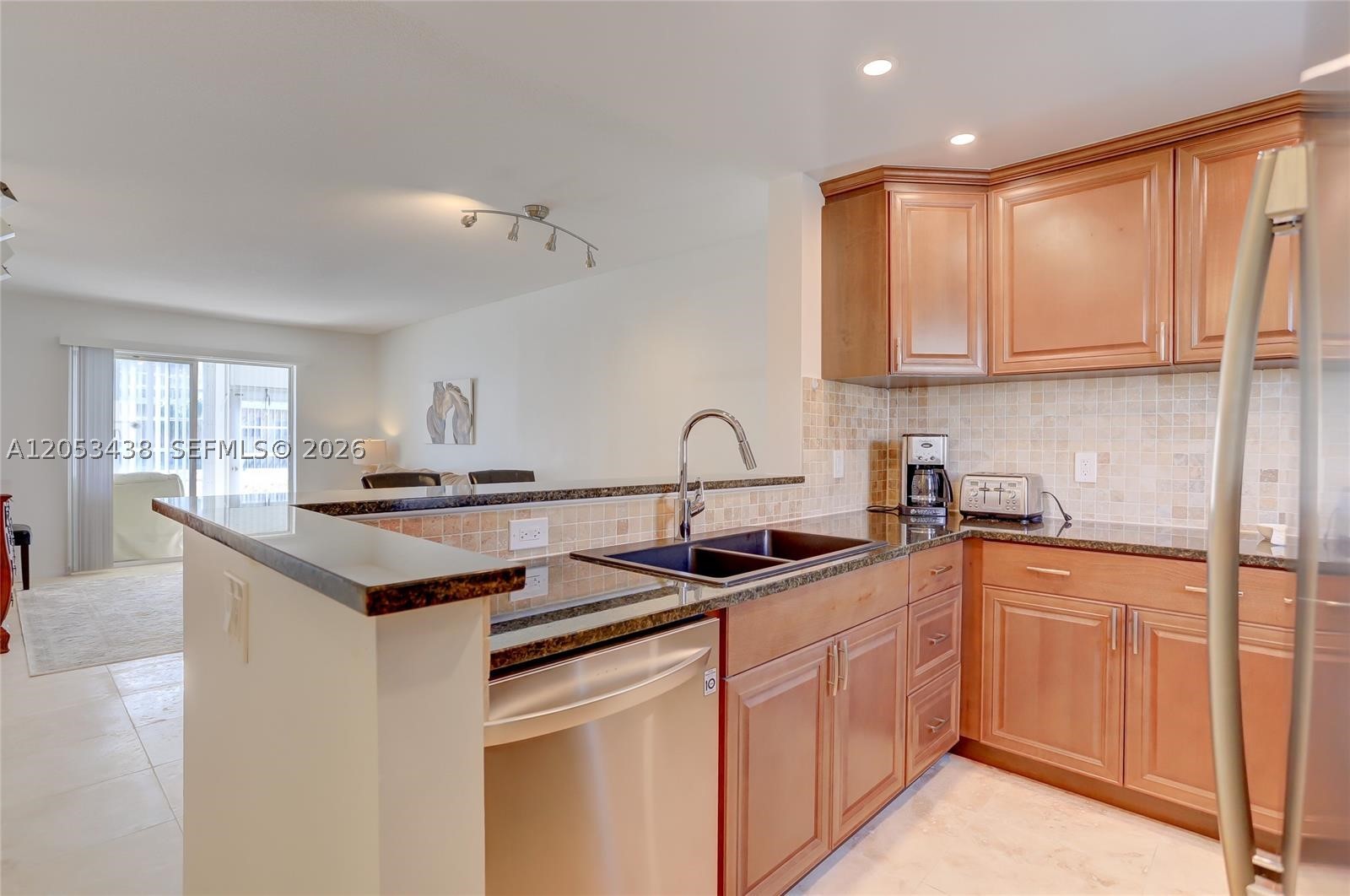 or Rent – Spacious 2BR/2BA Ground-Floor Corner Condo in Village Royale (55+ Community)

Beautifully updated 2BR/2BA ground-floor corner unit with a bright, open living/dining layout. The versatile Florida room includes an in-unit washer & dryer, perfect as a sunroom or home office. Premium finishes run throughout, including travertine tile flooring, solid wood cabinets, granite countertops, stainless appliances, and German-made faucets. Both bedrooms are generously sized with ample closet space. Upgrades include a newer water heater and impact-rated front door.

LEASE TERMS & HOA:
Per strict Association rules, this unit may only be leased once per calendar year. Landlord seeks a long-term tenant for a minimum 10-to-12 month lease. No short-term, seasonal, or vacation rentals permitted. Village Royale is an active 55+ community. Association approval required (minimum 700 credit score).

INCLUSIONS & AMENITIES:
Rent includes water, sewer, trash, cable, high-speed internet, and lawn care. Assigned parking is steps from the unit, with ample guest parking. Enjoy resort-style amenities: heated pool, clubhouse, library, shuffleboard, and BBQ area.

LOCATION & DIRECTIONS:
From I-95, exit Boynton Beach Blvd East, left on US-1, right on NE 22nd Ave, immediate right on NE 1st Ct. Building is on the right. Just 5 minutes to the beach and Sunshine Square Publix. Close to dining, downtown Delray, and PBI/FLL airports.