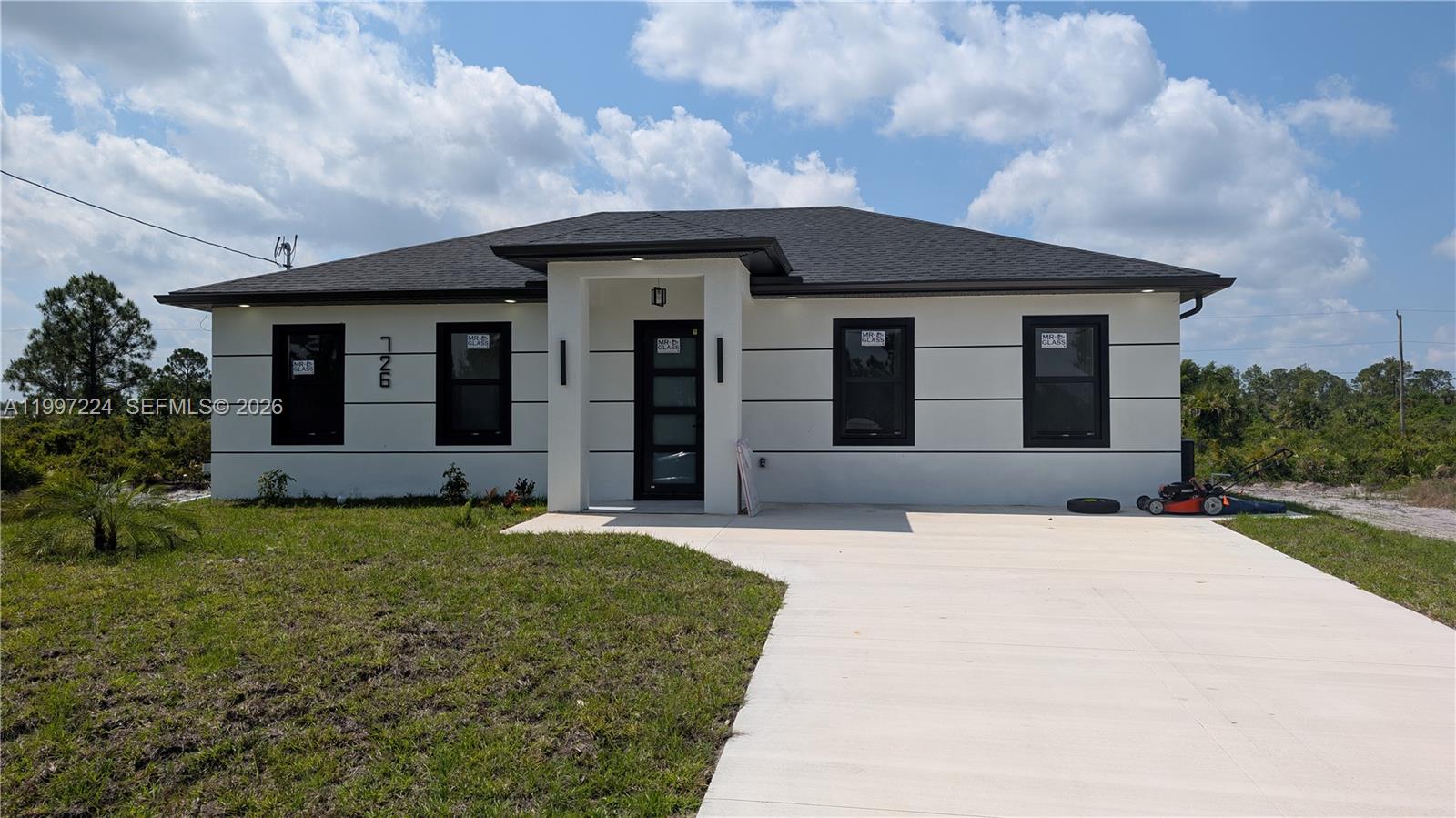 PRICE REDUCED $30,000.00. Perfect property for first time buyers o Investors 2 Master rooms and Mother-In-Law Suit with independent exit. Excellent source of income, for guest or extended family. Granite in kitchen and bathrooms, walk in shower, all tile, impact windows and door, all modern and upgrade finish. Ready to move in. Call and schedule a private tour. photos are Ai staged.