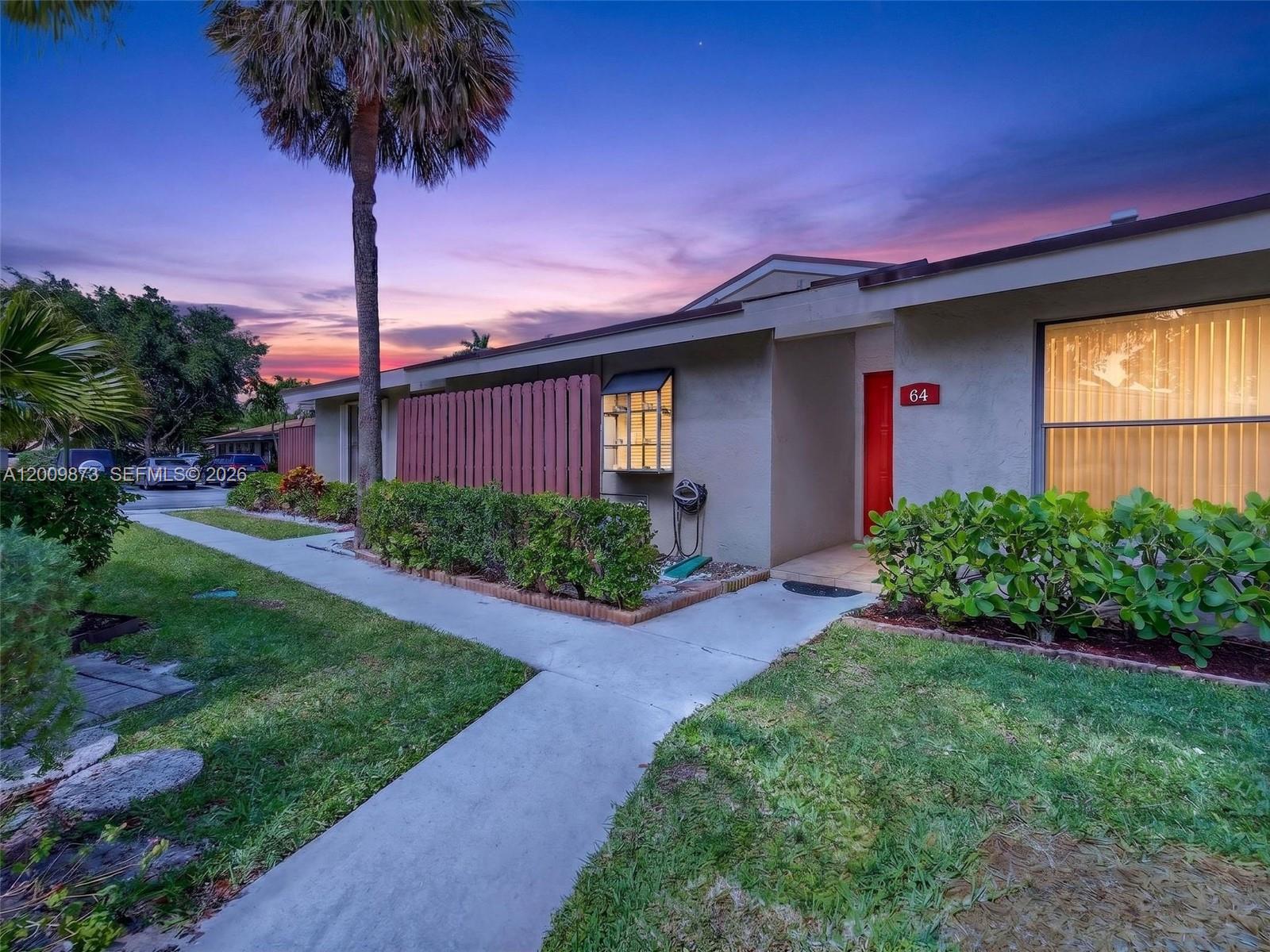 Bright and inviting 3-bedroom, 2-bath residence located in the desirable Willow Brook community of Boynton Beach. This well-maintained home features neutral wall and ceiling tones, creating a clean, modern canvas ready for your personal touch. Expansive glass doors and large windows fill the space with natural light, enhancing the open and airy feel throughout. The spacious kitchen offers ample room for cooking and entertaining, while the dedicated laundry room adds everyday convenience. The primary bedroom showcases elegant wood flooring, providing warmth and comfort, while the additional bedrooms are well-sized and versatile. Enjoy seamless indoor-outdoor living with abundant natural light and easy access to outdoor spaces. The property also includes two assigned parking spaces for added convenience. Nestled in a quiet, well-kept community, residents benefit from a peaceful environment while still being just minutes from shopping, dining, and major roadways, including easy access to Interstate 95 and nearby retail hubs like Boynton Beach Mall. Whether you're a first-time buyer or looking to upgrade, this home offers the perfect blend of comfort, style, and location.