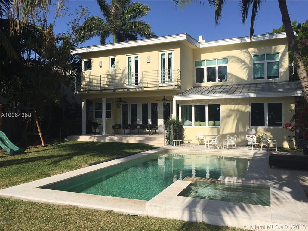 Fabulous & Expanded new construction 4/5 home on large lot with 65 ft waterfront frontage, 50 ft boat dock Contemporary & top of the line finishes, 8" wide plank real wood flooring and original terrazzo, high end fixtures and appliances. 1.5 Car Garage with Separate half bath. Pool, spa, children's play area and gated exterior area provide ideal indoor & outdoor living and 20,000 lb boat lift.  Great Location & easy access to area schools & 41st St.  Must see.  Call listing broker/owner for showings.