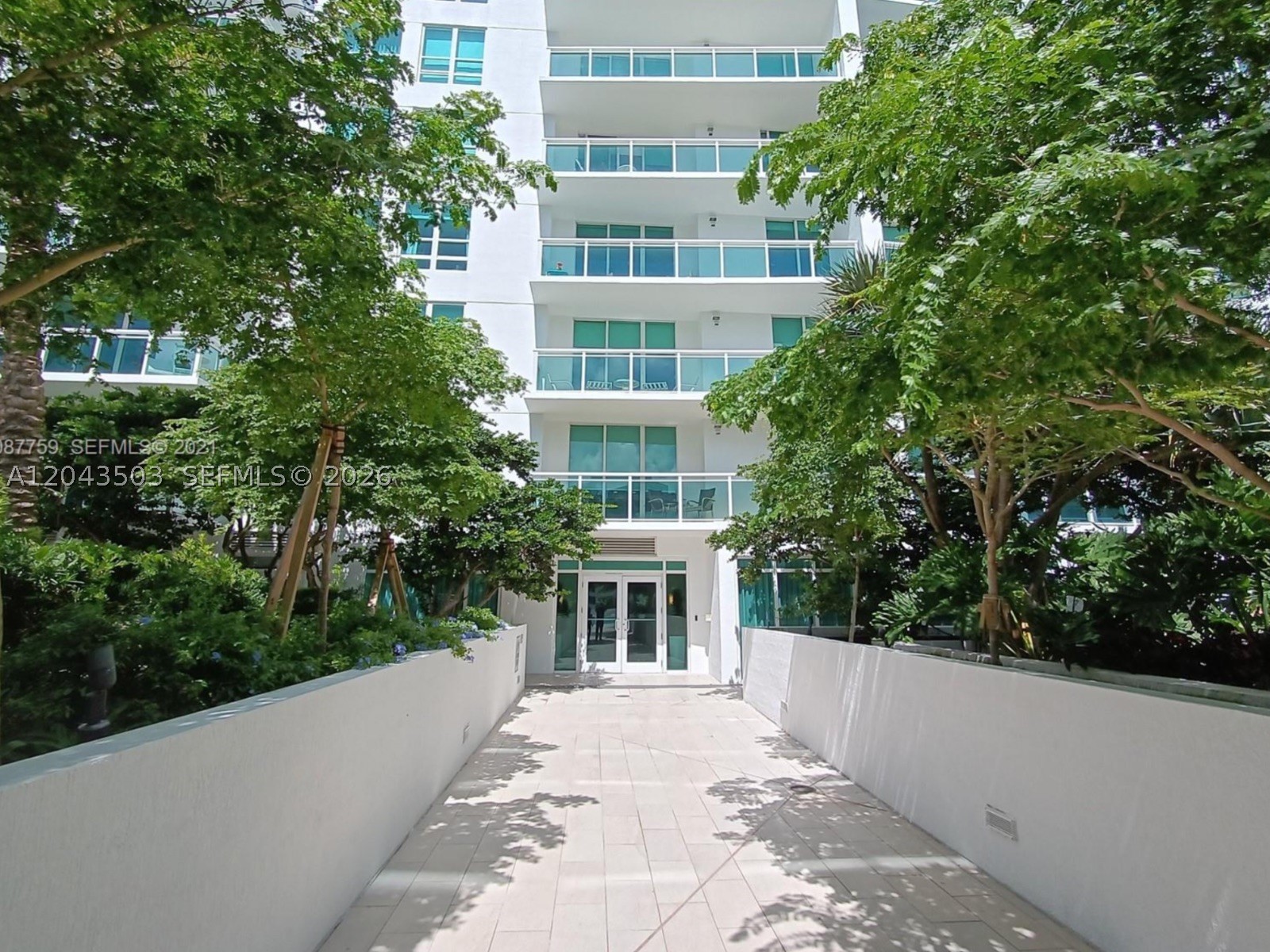 A tandem garage space for 2 cars is included with this freshly painted unit! Experience luxurious urban living in this stunning 2-bedroom, 2-bathroom condo in the heart of Miami’s vibrant Brickell neighborhood. Floor-to-ceiling sliding impact-resistant glass doors and a private balcony frame breathtaking views of tropical landscaping and sparkling Biscayne Bay. The open-concept layout is perfect for modern living and entertaining, featuring a split-bedroom design for maximum privacy, 9-foot ceilings, and abundant natural light. In-unit washer/dryer adds everyday convenience. Resort-style amenities at The Plaza on Brickell elevate your lifestyle:
•  Two infinity-edge heated swimming pools with lounge chairs and hot tub
•  State-of-the-art fitness center and spa with steam room and sauna
•  Clubroom with billiards, kitchen, and media center
•  Business center for productivity
•  Wine storage room
•  24/7 concierge, valet parking, and controlled gated entry with attended lobby
•  On-site retail and dining options just steps away
Located in one of Miami’s most dynamic areas, you’re surrounded by world-class restaurants, upscale shopping at Brickell City Centre, waterfront parks, and effortless access to downtown, South Beach, and major highways. Walk to Metrorail for seamless commuting.This is more than a home—it’s your gateway to limitless city living. Schedule a private tour and make Unit 1206 your new address in Miami!
