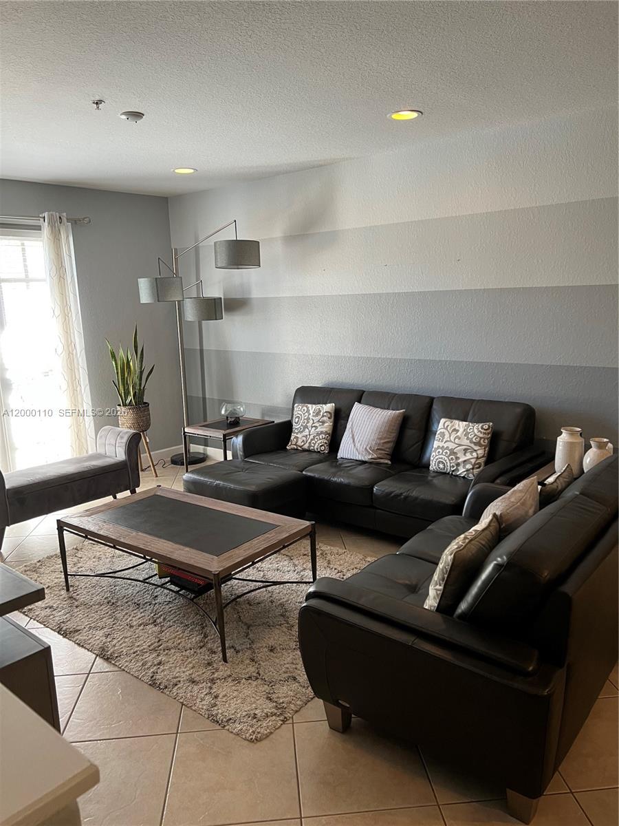 3-bedroom, 3-bath renovated condo villa located in the highly desirable Cobblestone community in Pembroke Pines. This home features a fully updated kitchen with stainless steel appliances, quartz countertops, and extended cabinetry, along with beautifully renovated bathrooms throughout. Enjoy three private balconies and a full smart home system with prewired switches—control lighting, fans, A/C, and more with ease.

The HOA includes Comcast HD cable with DVR, high-speed internet, and alarm monitoring. The home also offers a full-size in-unit washer and dryer, as well as impact windows and doors for added security and efficiency.

Residents enjoy resort-style amenities, including a pool, fitness center, clubhouse, and tot lots. Ideally located just one traffic light from I-75, with walkable access to Whole Foods and numerous restaurants in Cobblestone Plaza. Close to grocery stores, golf courses, fine dining, shopping, and top-rated A schools. The Shops at Pembroke Gardens is just 1 mile away.

Fee simple ownership.

Tenant Moves out June 1. Available to show by appointment.