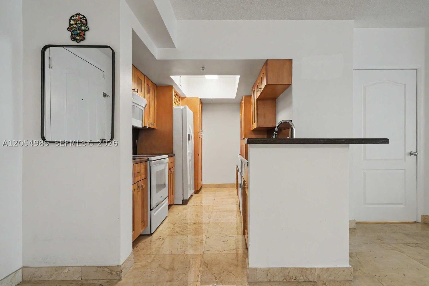 Wake up to peaceful Blue Lagoon views while enjoying one of Miami’s most convenient locations. This spacious 2-bedroom, 2-bath residence offers nearly 1,000 square feet of bright, functional living space, providing the comfort of a larger home without the premium price tag.

Enjoy tranquil lagoon views and an outstanding collection of resort-style amenities, including a heated pool, spa, sauna, fully equipped fitness center, billiards room, media lounge, and outdoor barbecue area. The unit also includes one assigned covered parking space, plus ample guest parking.

Perfectly positioned just minutes from Miami International Airport, Brickell, Downtown Miami, Coral Gables, and major highways, you’ll enjoy effortless access to everything Miami has to offer while coming home to a peaceful waterfront setting.

Don’t miss this opportunity to own one of the best values in the Blue Lagoon area.
Come see it today.
