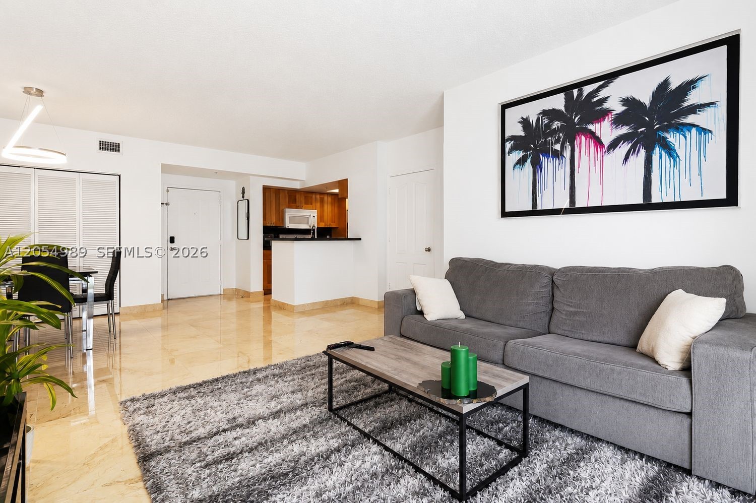 Wake up to peaceful Blue Lagoon views while enjoying one of Miami’s most convenient locations. This spacious 2-bedroom, 2-bath residence offers nearly 1,000 square feet of bright, functional living space, providing the comfort of a larger home without the premium price tag.

Enjoy tranquil lagoon views and an outstanding collection of resort-style amenities, including a heated pool, spa, sauna, fully equipped fitness center, billiards room, media lounge, and outdoor barbecue area. The unit also includes one assigned covered parking space, plus ample guest parking.

Perfectly positioned just minutes from Miami International Airport, Brickell, Downtown Miami, Coral Gables, and major highways, you’ll enjoy effortless access to everything Miami has to offer while coming home to a peaceful waterfront setting.

Don’t miss this opportunity to own one of the best values in the Blue Lagoon area.
Come see it today.
