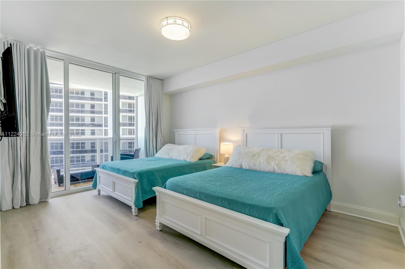 BEACH CLUB TWO - Residential Lease