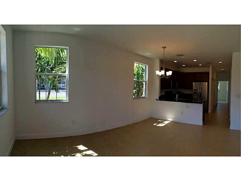 BRAND NEW CONDO NEVER OCCUPIED in the heart of Pembroke Pines next to I-75 and across the Pembroke Garden Mall. Excellent location just across the pool and clubhouse. One-story with 2 beds 2 baths, walk-in closet, tile floor in living areas and carpet in  bedrooms. High impact windows. Spacious kitchen, 42" wood cabinetry, granite top and stainless steel appliances. Exclusive community with gated entrance,  clubhouse with recreation and exercise room, playground and pool.