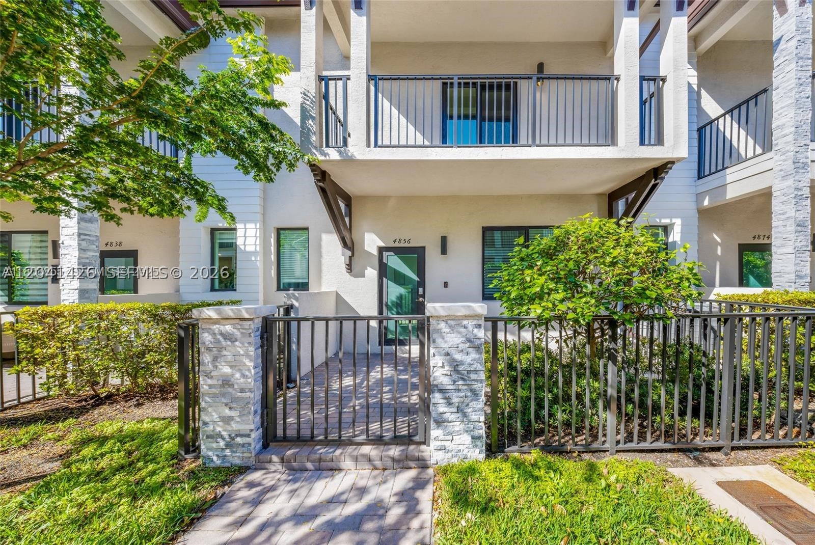 Welcome to this exceptional contemporary townhouse in the heart of Doral, one of South Florida’s most sought-after communities. Built in 2020 and meticulously maintained, this beautiful two-story residence offers 3 bedrooms, 2.5 bathrooms, and the perfect combination of style, comfort, and location.
The bright and open floor plan features a modern designer kitchen with elegant quartz countertops, contemporary cabinetry, and premium finishes, seamlessly flowing into the spacious living and dining areas. The first floor showcases stylish ceramic tile flooring, while the second level features beautiful wood flooring throughout, creating a warm and sophisticated atmosphere. This home truly feels like new.
Enjoy the convenience of a one-car garage and a lifestyle that is second to none. Located just steps from Downtown Doral, you'll have easy access to restaurants, cafés, boutiques, parks, entertainment, top-rated schools, and everyday conveniences—all within walking distance. Major highways are just minutes away, and Miami International Airport is approximately 20 minutes from your doorstep.
Perfect for both homeowners and investors, this property offers an unbeatable combination of location, modern finishes, and long-term value. Live in one of South Florida’s most vibrant and growing neighborhoods where shopping, dining, recreation, and top schools are all just a short walk away.