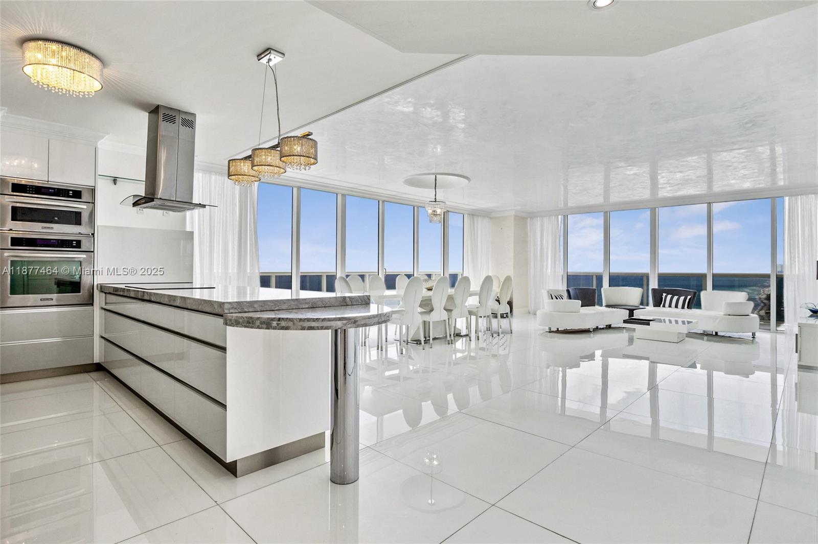 The most desired 2-story Penthouse in Beach Club. Southeast corner residence with ultimate privacy and breathtaking direct ocean and Intracoastal views from the 51st & 52nd floors. Offering 3,348 sq ft of interior space plus 2,269 sq ft of terraces for a total of 5,617 sq ft. Fully furnished & upgraded with custom Italian kitchen, quartz countertops, S.S. appliances, built-in closets, custom lighting, and 36x36 white glass floors. 4 bed / 4 baths and an oversized rooftop terrace. 5-star resort-style amenities: concierge, 24-hr valet & security, 40,000 sq ft spa & fitness center, restaurant, bar with pool service, and 810 ft of ocean frontage.