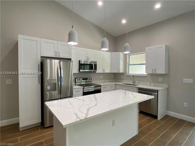 Location! Location! Elegant designed newer duplex for sale in at the begining of Lehigh Acres. Each unit boasts 3 bedrooms 2 baths with an open floor plan,  fully tiled with lanai and a larger 1 car garage on each side.
Amenties include LED lighting, quartz counter tops, Large kitchen with island/ample storage, stainless steel appliances, impact windows and sliding doors, walkin closet, cathedral ceilings. Location is very close to SR-82/ Daniels and Colonial Blvd for quick access to the airport, major hospitals, and interstate I-75. There's no HOA, CDD fees. Leased with excellent tenants. Possiblity for first time homebuyer as well!