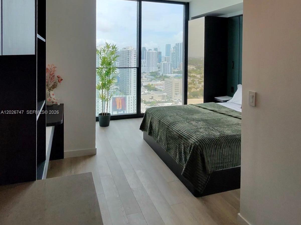 E11EVEN CLUB RESIDENCES - Residential Lease
