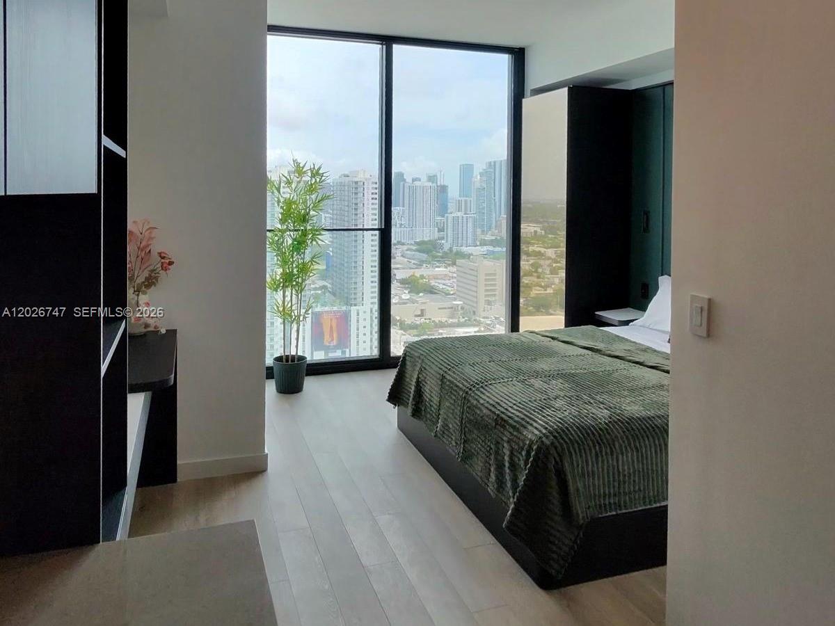 E11EVEN CLUB RESIDENCES - Residential Lease