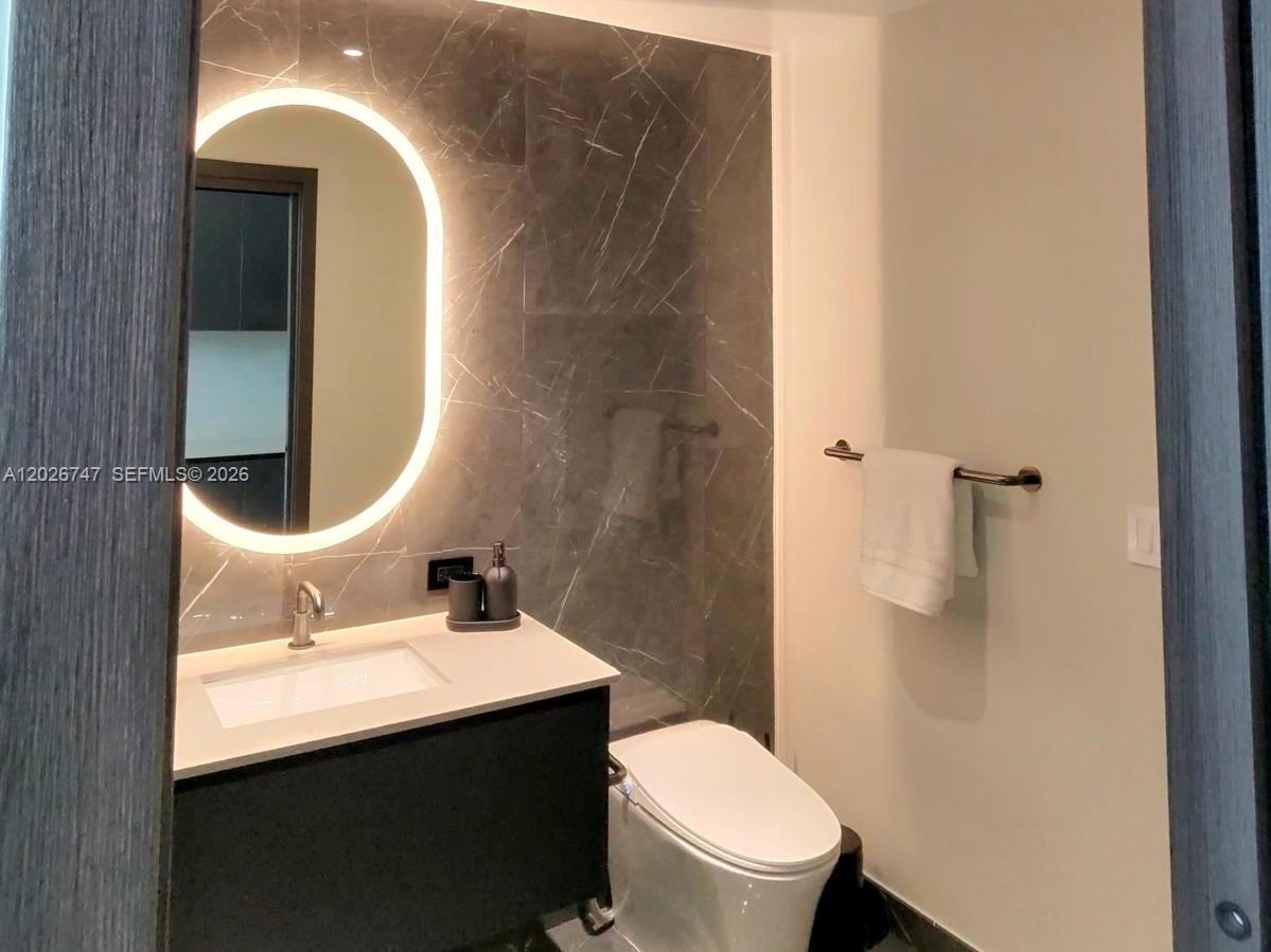 E11EVEN CLUB RESIDENCES - Residential Lease