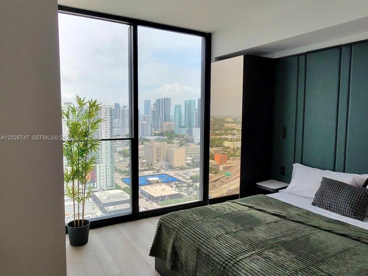 E11EVEN CLUB RESIDENCES - Residential Lease