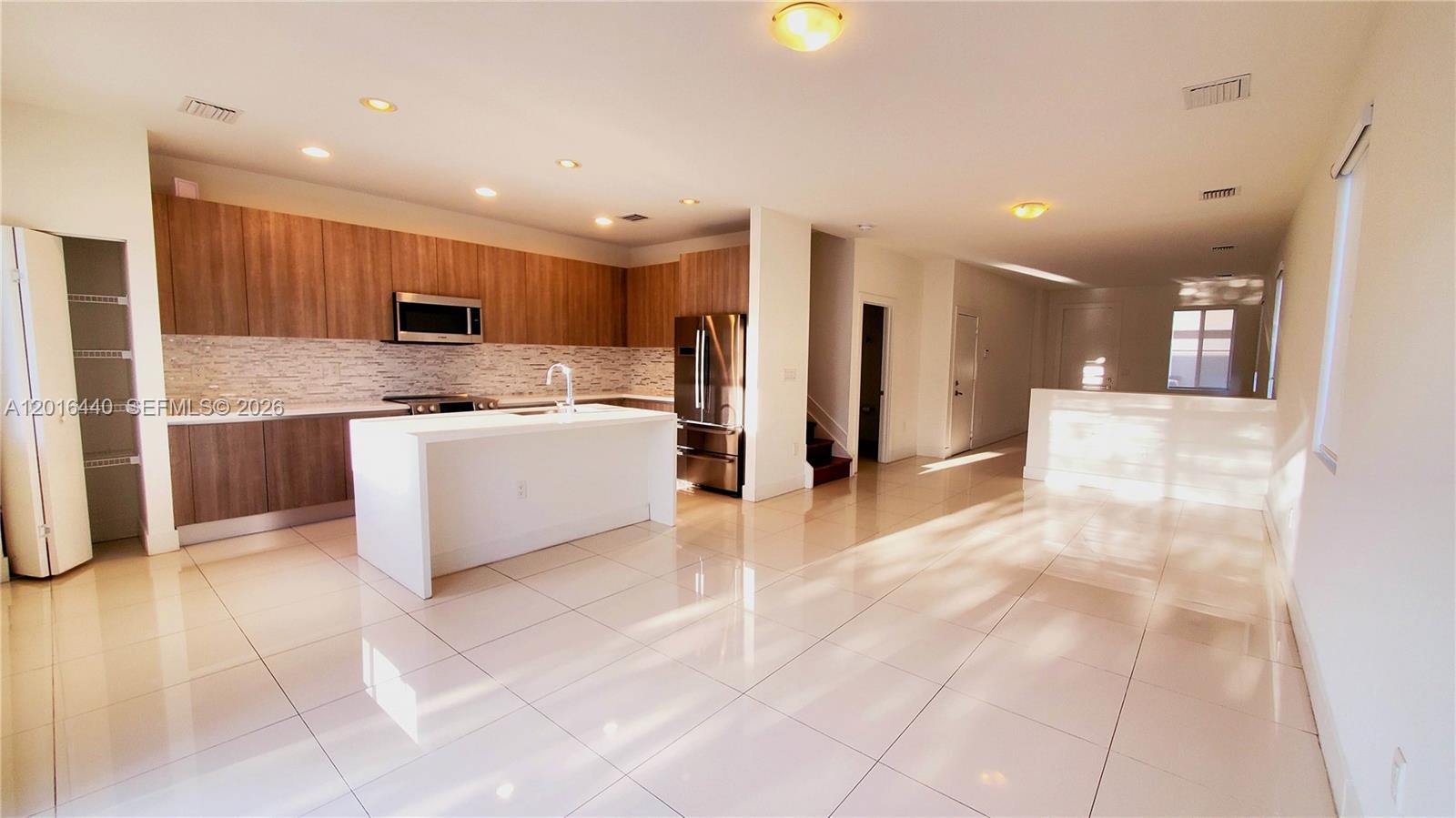 Discover luxurious living, a stunning brand-new 4-bedroom, 3.5-bath home in Doral, FL. This beautiful residence features spacious living areas, top-of-the-line appliances, and generous bedrooms designed for comfort. Located near the vibrant Doral Commons Plaza, you'll enjoy easy access to shopping, dining, and amenities, including a new Publix and popular restaurants. Doral is a shopping destination, with Miami International Mall and Dolphin Mall nearby. The area boasts an active outdoor lifestyle, with parks like Doral Central Park and Doral Meadow Park. Families will appreciate the highly-rated schools in the area, including Doral Academy and John I. Smith K-8 Center, making this community perfect for both luxury living and excellent education.