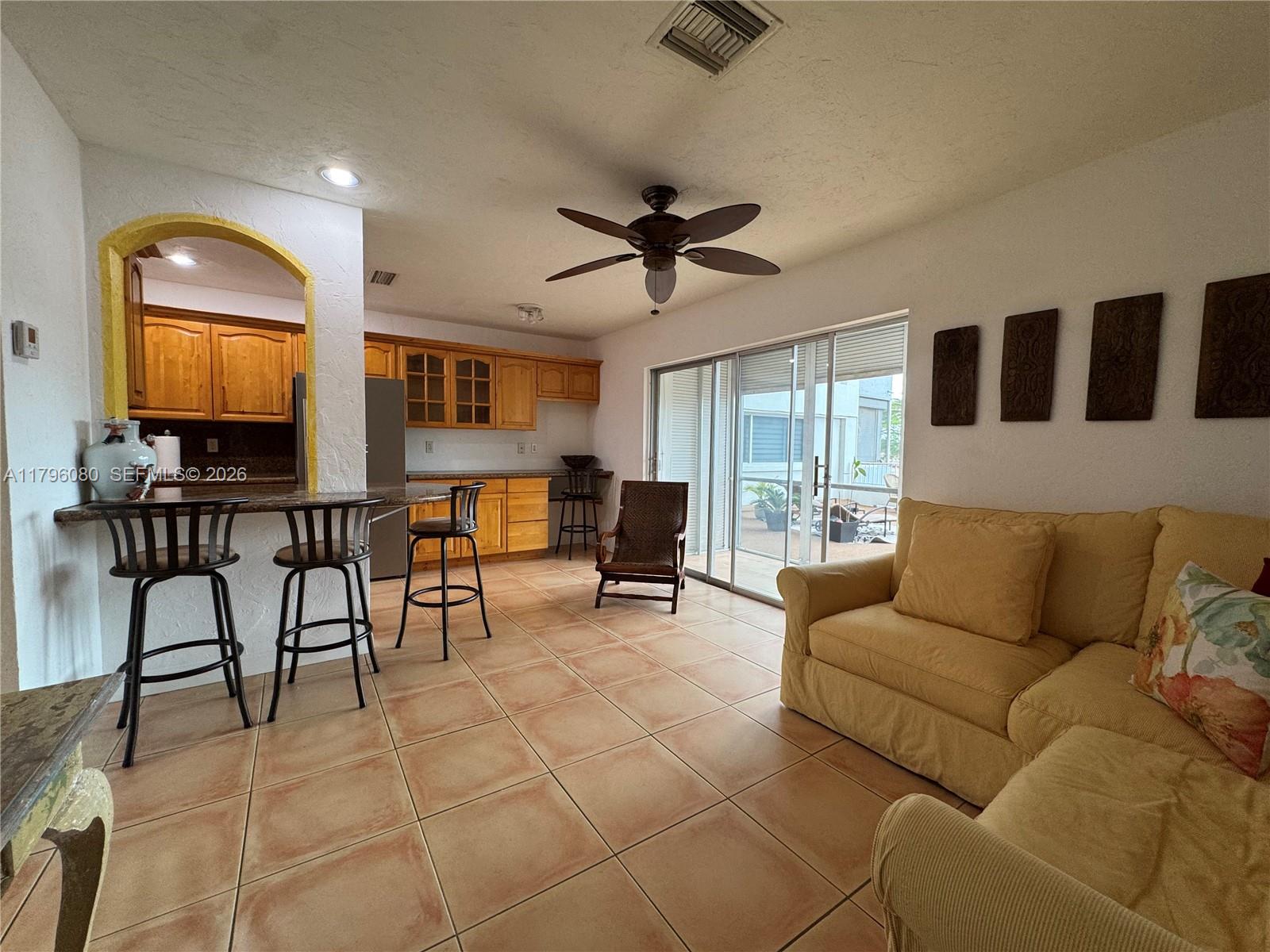 Stunning 1-bedroom unit with gorgeous views of the new Hollywood Beach Golf Resort. This renovated unit features an open kitchen with brand new stainless steel appliances, tile floors, and an upgraded bath. Enjoy the morning sun on the spacious balcony with access to a common patio. Located east of US-1 in Hollywood Lakes, just 0.2 miles from Downtown Hollywood's new Publix, Circ Hotel and Young Circle's ArtsPark. Golf course renovation is complete and new clubhouse/restaurant will open soon. (Ribbon cutting is on April 22nd.) Take the shuttle service to Hollywood Beach. Recent building upgrades include a new elevator, fire alarms, exterior paint, and new paving in all parking areas. Membrane roof is being replaced with a special assessment that seller has paid. 40-year certification done and no other special assessments. One unassigned parking space. Buyers under 55 can be approved.