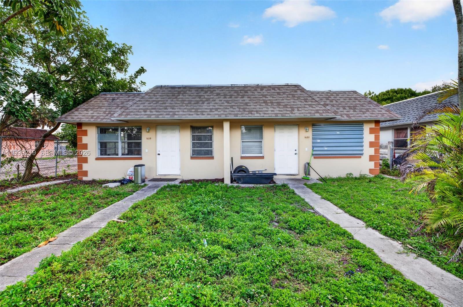 This Fort Lauderdale duplex presents a prime opportunity for both investors and end users, ideally situated near the airport, major roadways, and the area’s renowned beaches. Each unit offers 3 bedrooms and 1.5 bathrooms, providing spacious and functional layouts filled with natural light. 2500+ sq ft under air! One residence has been fully renovated, featuring contemporary finishes, a modern kitchen, updated bathrooms, and cohesive flooring throughout. The second unit has been partially upgraded, offering the perfect opportunity for a buyer to complete the improvements and add value. Currently both units tenant-occupied on annual leases. The units generate strong rental income. Unit 1619 rented for $2000/monthly lease expires Jan 31, 2027. Unit 1621 rented for $2500/monthly lease expires Aug. 31, 2026. The property also benefits from a newer permitted roof installed in 2022. Both units have their own laundry room w/ washer/dryer connections. Siemens & Square D electrical panels. Conveniently located near shopping, dining, and entertainment, this property offers flexibility, income potential, and long-term upside in a highly desirable area.