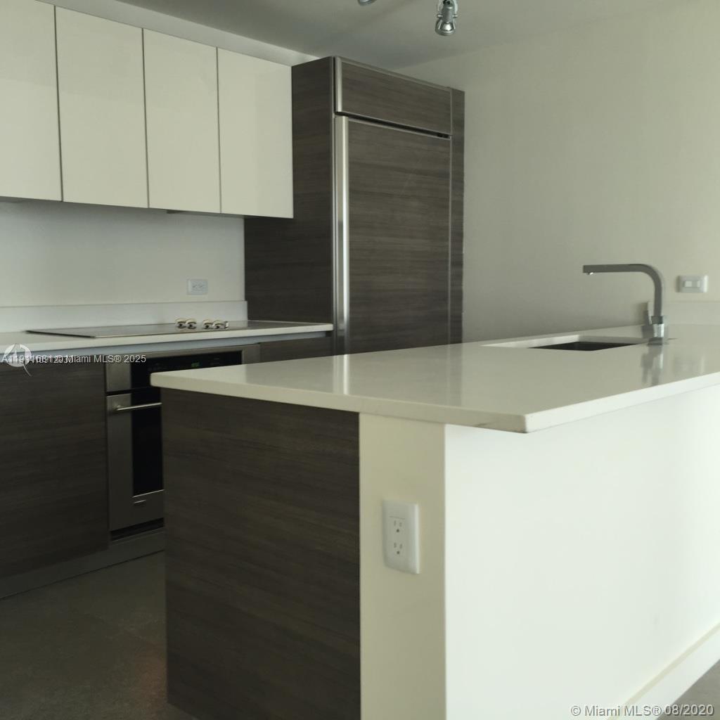 The most desirable 2+2+DEN in the exclusive PININFARINA design building over looking Brickell and Biscayne bay, this high-end condo unit has everything to offer. High grade marble flooring throughout the entire unit to match the upscale Italian kitchen and beautiful baths. Ideal central location in Brickell, people mover and metro station, The Millecento building offers luxury amenities. Party rooms, a rooftop pool over looking Miami, state of the art gym, children's playroom, theater, and more... steps away from Publix, shops, and Brickell City Center Mall.