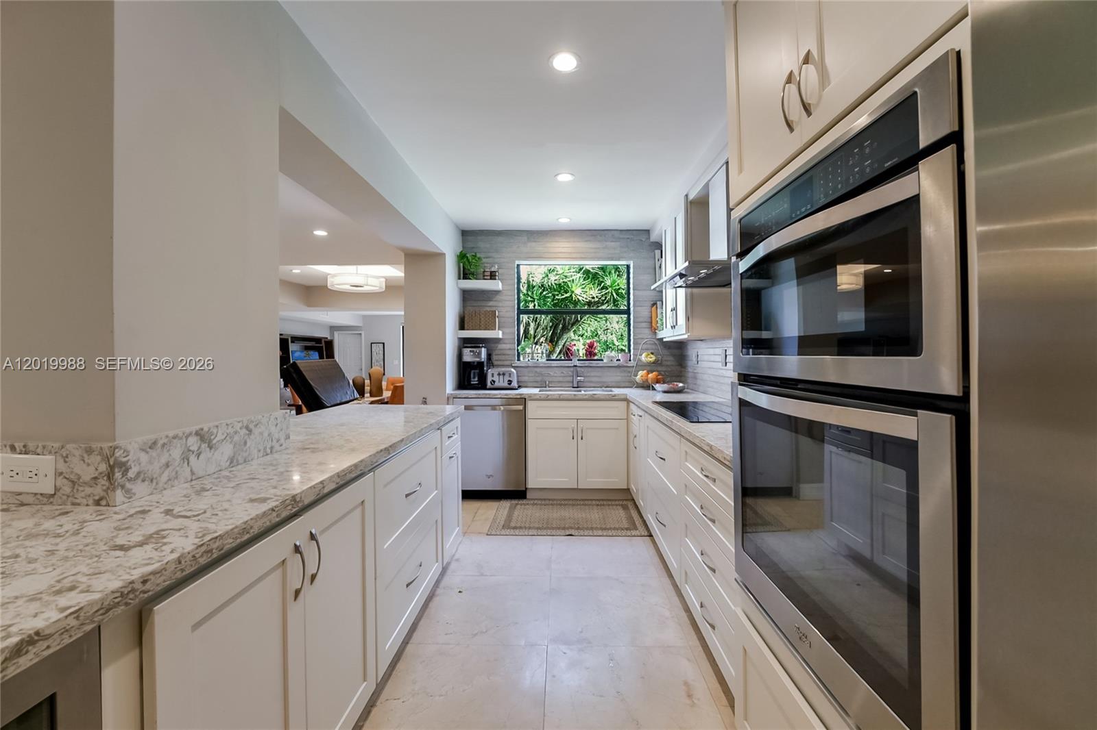 REMODELED OCEAN ACCESS, WATERFRONT SANCTUARY IN SUNNY ISLES! THIS BEAUTIFUL 4BR/4BA PLUS DEN, CORNER TOWNHOUSE IN GUARD-GATED POINCIANA ISLAND OFFERS LUXURY PRIVACY & ABUNDANT NATURAL LIGHT. UPGRADED WITH AN EXTENDED GOURMET KITCHEN, WALK-IN PANTRY, UPDATED BATHROOMS, AND A LARGE MASTER SUITE BOASTING INCREDIBLE WATER VIEWS. ENJOY A LARGE, PRIVATE FENCED PATIO FEATURING HIGH-TECH ARTIFICIAL TURF, A 1-CAR GARAGE, & SERENE VIEWS OF THE INTRACOASTAL & ATLANTIC ISLE. RESORT AMENITIES: DEEDED DOCK, 2 POOLS, GYM, SAUNA, SECURITY, & TENNIS/PICKLEBALL. MINS TO BEACH & DINING. EASY 1-2 WEEK APPROVAL.