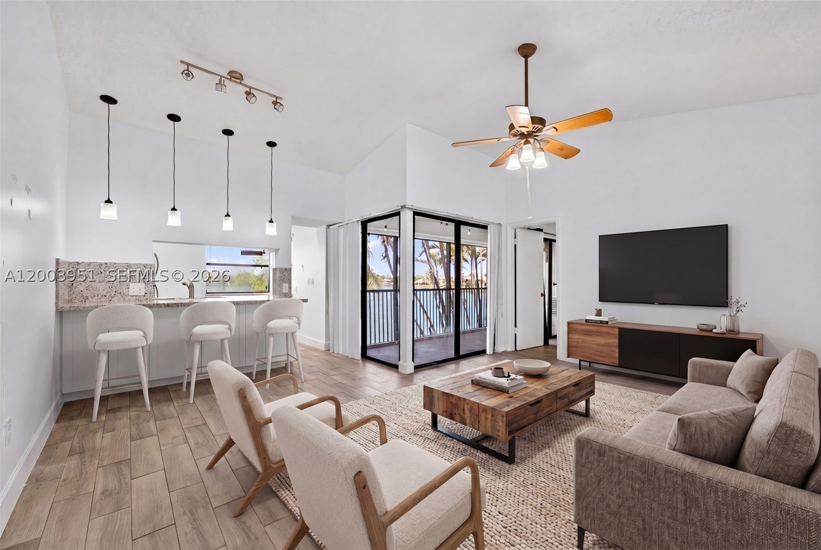 Experience lakeside living and convenience in this beautifully renovated, 2-bedroom, 2-bathroom turn-key condo located within the highly-desired, gated Lakeshore community. This modern residence boasts a bright, elevated by sleek tile flooring, a fully remodeled kitchen, and sophisticated upgraded lighting throughout. Whether you're enjoying the tranquility of lakeside living or taking advantage of the seamless commute near major highways, premier shopping, and fine dining, this move-in-ready gem offers a sophisticated lifestyle in an unbeatable location, schedule your private tour today!