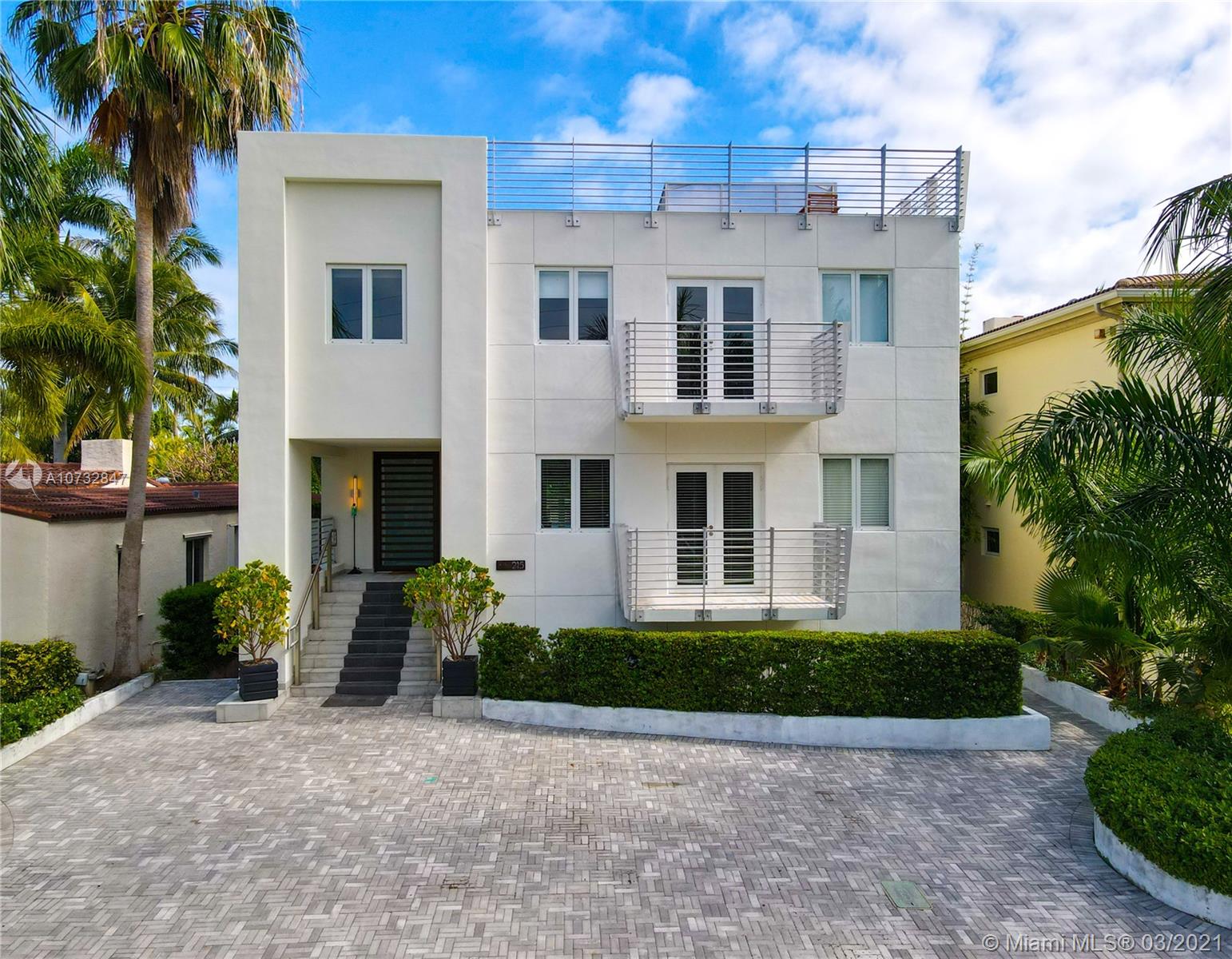 Modern, fully upgraded, three-story residence on prestigious Palm Island. In addition to the grand living and family room, open kitchen, two master suites, imported Italian finishes, this home has 2,500 SQ FT large sky terrace offering stunning water and sunset views. All impact glass windows, custom closets, cameras, security and sound system, are part of this rarely large home.
