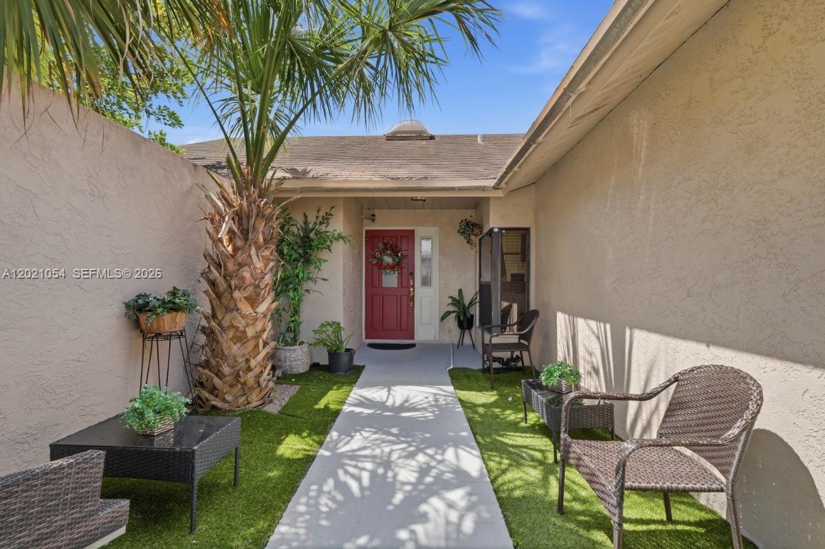 Spacious 3 Bedroom 2 bath house with pool located in The Villages of Hillsboro in Deerfield Beach! Features a large kitchen with granite countertops, stainless steel appliances, vaulted ceilings, and abundant natural light throughout. Split-bedroom floorplan with a LARGE primary suite and walk-in closet. Part of the garage has been converted into an additional room with private entrance, ideal for income potential, guest space, office, or flex room. Can easily be converted back into a garage if desired. Conveniently located near schools, shopping, Quiet Waters Park, and only about 5.5 miles from the beach. Excellent location and easy to show!