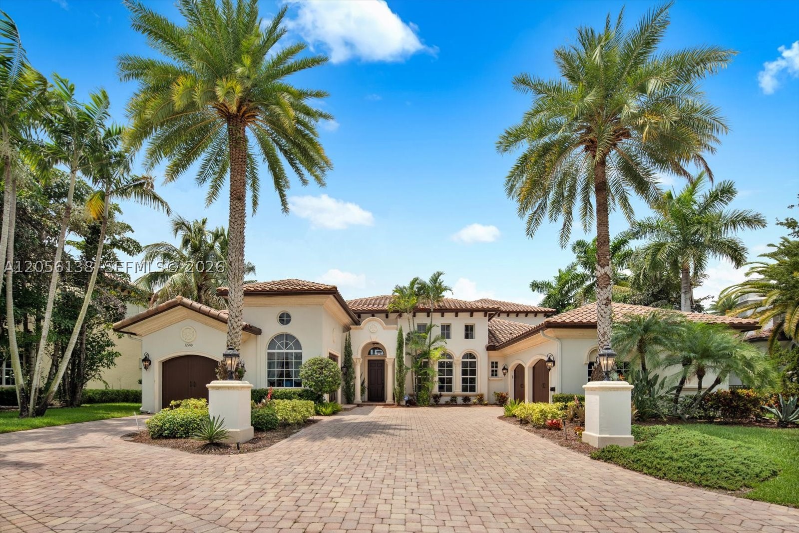 Welcome to an exceptional estate nestled on a premium cul-de-sac lot in the prestigious gated community of Heron Estates at Heron Bay. Showcasing breathtaking lake and preserve views, this magnificent residence offers over 5,000 square feet of elegant living space with 6 bedrooms, 6 full bathrooms, 1 half bath, a private office, creating the perfect balance of luxury, comfort, and functionality. 

Designed for both everyday living and grand entertaining, the gourmet chef's kitchen flows seamlessly into expansive living areas filled with natural light and soaring ceilings. High-end finishes include marble and engineered wood flooring, impact glass windows and doors, beautifully updated marble bathrooms, a central vacuum system, and a three-car garage with epoxy flooring. 

Step outside into your private backyard oasis featuring a sparkling heated pool with spa and sun shelfi, and an oversized balcony overlooking tranquil water and preserve views, an idyllic setting for relaxing or entertaining year-round. Recently refreshed with new interior and exterior paint along with upgraded pool finishes, this home is truly move-in ready.

Residents of Heron Bay enjoy access to two resort-style clubhouses, fitness centers, tennis courts, pools, scenic walking trails, and some of Parkland's top-rated schools. This is a rare opportunity to own one of the community's finest luxury homes in one of South Florida's most sought-after neighborhoods.