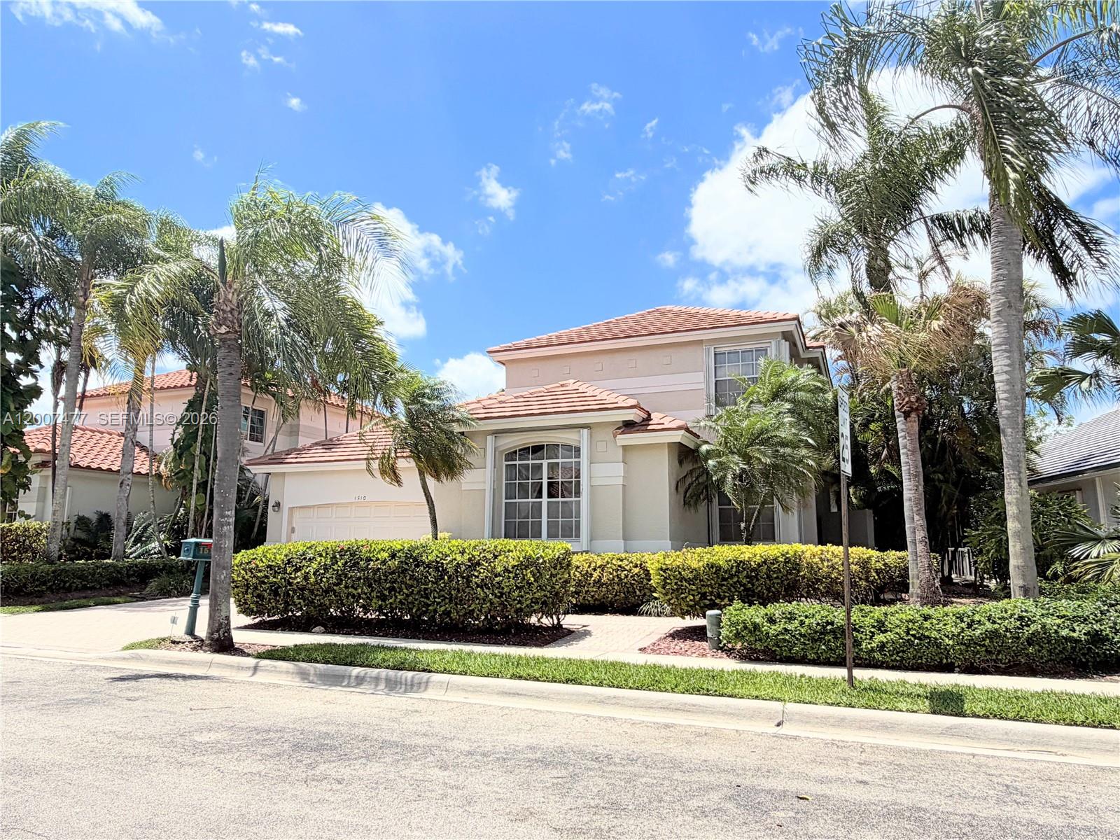 This 4-bedroom 3.5 bathrooms at the Grand Plains Golf Community features stunning golf and lake views from a private backyard. Bright, open layout with soaring ceilings and a spacious family room. The first floor offers three bedrooms, including the primary suite; the second floor includes a private den and a full guest suite. Accordion shutters, one brand-new A/C and a second in excellent condition, plus an oversized patio ideal for outdoor living. HOA covers lawn care and exterior painting for a low-maintenance, worry-free lifestyle. Conveniently located near top-rated schools, shopping, dining areas, Whole Foods Market, Costco, and I-75. Schedule your private showing today.
