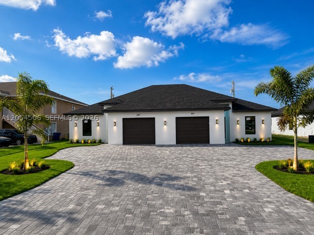 CITY WATER AND SEWER WITH ALL ASSESSMENTS PAID IN FULL, IMPACT-RESISTANT WINDOWS AND DOORS, NO HOA restrictions and NO FLOOD ZONE. Whether you're looking for a primary residence or an exceptional investment opportunity, this duplex is move-in ready and built to last. Brand-new CBS construction duplex offering the perfect blend of modern design, quality craftsmanship, and an unbeatable central Cape Coral location. Each never-occupied unit features 3 bedrooms, 2 bathrooms, beautiful porcelain tile flooring throughout, an interior laundry room, and energy-efficient tankless water heaters. Ideally situated within walking distance to Sun Splash Family Waterpark, The Courts pickleball and tennis complex, Cape Coral Charter School, a veterinary hospital, Santa Barbara Lanes, Eagle Skate Park, William "Bill" Austen Youth Center, CrossFit ENG, and Lake Kennedy Community Park, residents will enjoy easy access to some of Cape Coral's most popular recreational and community amenities. Combining premium construction, modern finishes, and a highly desirable location, this brand-new duplex offers an outstanding opportunity to own a quality property in one of Southwest Florida's fastest-growing communities. More photos coming soon! Stay tuned