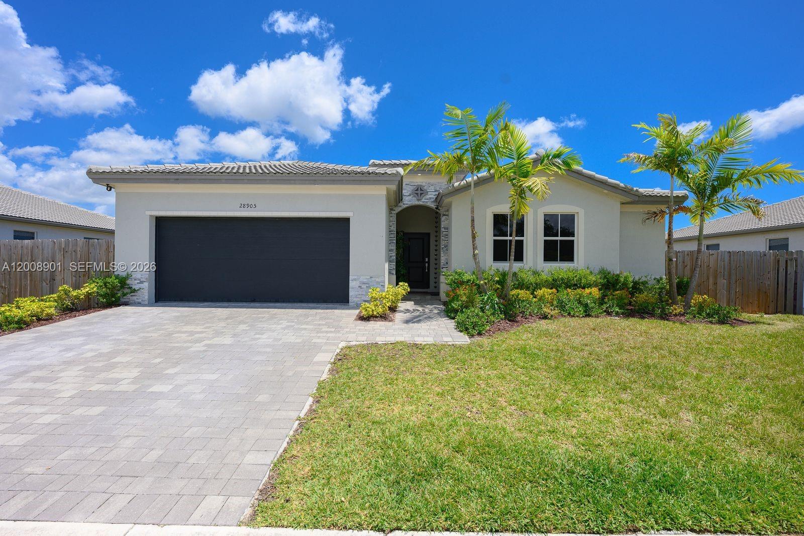 Welcome to this Beautiful 4BR/3BA income producing home built in 2023, featuring tile flooring throughout, high hat lighting in and outside of the home , and an open concept layout. The modern kitchen includes all new appliances and stylish finishes. Enjoy a double car garage and a spacious 10,472 sq ft lot with room for a boat or RV. Includes a private 1BR/1BA in-law apartment with a remodeled kitchen and in-unit laundry perfect for guests or rental income. Community amenities include a clubhouse and pool gym and front maintenance . Move-in ready!