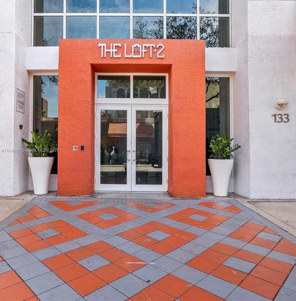 The epitome of chic! Make this urban oasis your home-in-the-sky! Features include 10' ceilings, a lustrous European-style kitchen, stainless steel appliances, a washer/dryer in the unit, a freshly painted expansive living area & private balcony. Stunning city & sunset views. Unfurnished & ready for move-in upon approval. Amenities include a rooftop pool, gym & residents' lounge with a billiard table & kitchenette. Take the Metro or walk to work, shopping & performing arts/arena events. 1 parking space allotted for an additional $60 monthly in the parking garage across from the building. A portion of the tenant's deposit will be applied towards the deposit held by the association. **NO Pets & NO Subleasing**