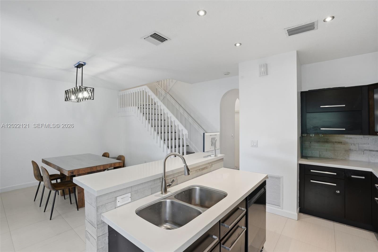DORAL NORTHEAST TOWNHOMES - Residential Lease